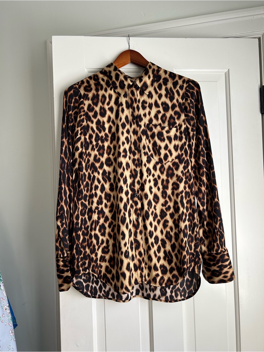 A. L. C. Silk leopard print button down shirt.